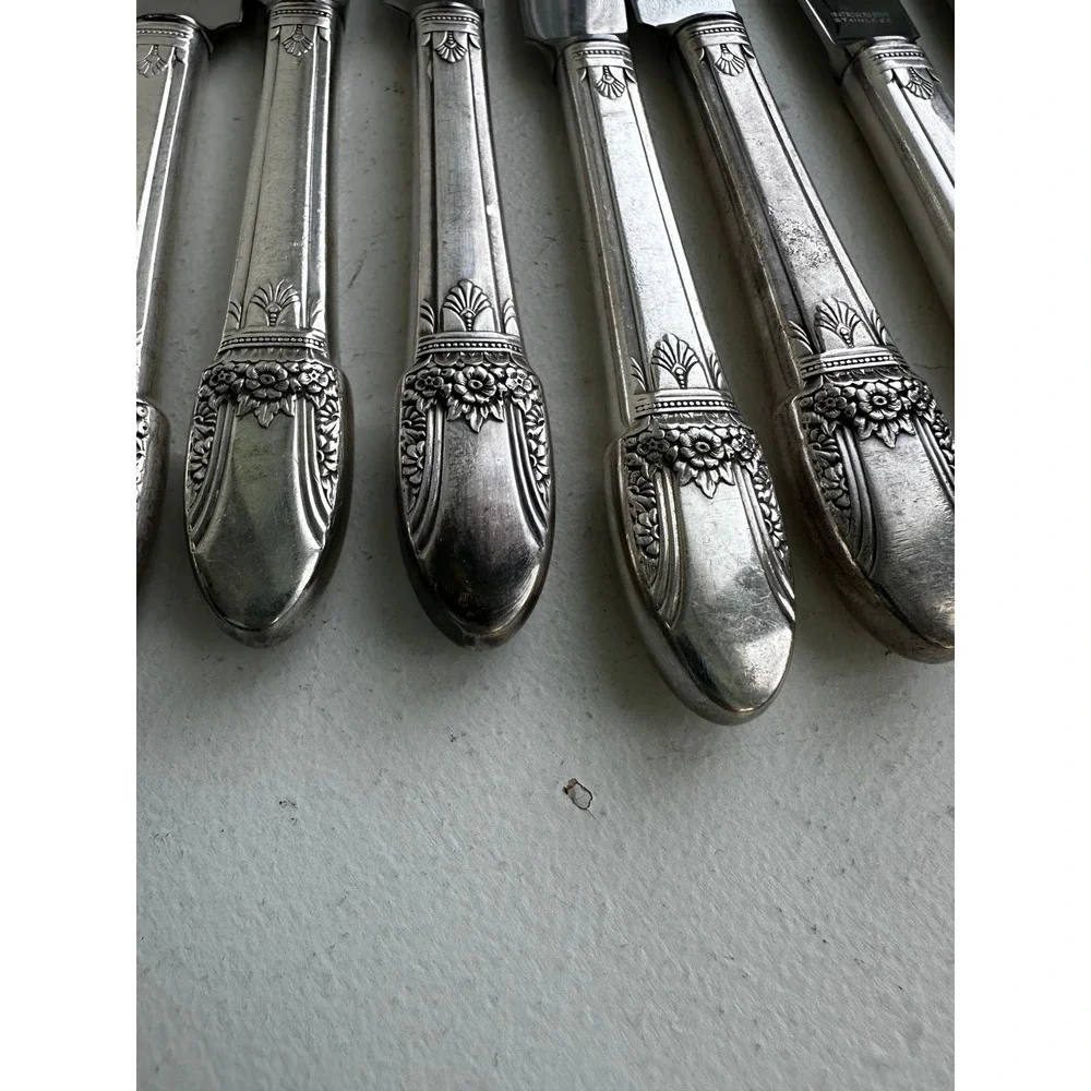 1937 Roger's Co. set of 8 First Love pattern stainless butter knives
